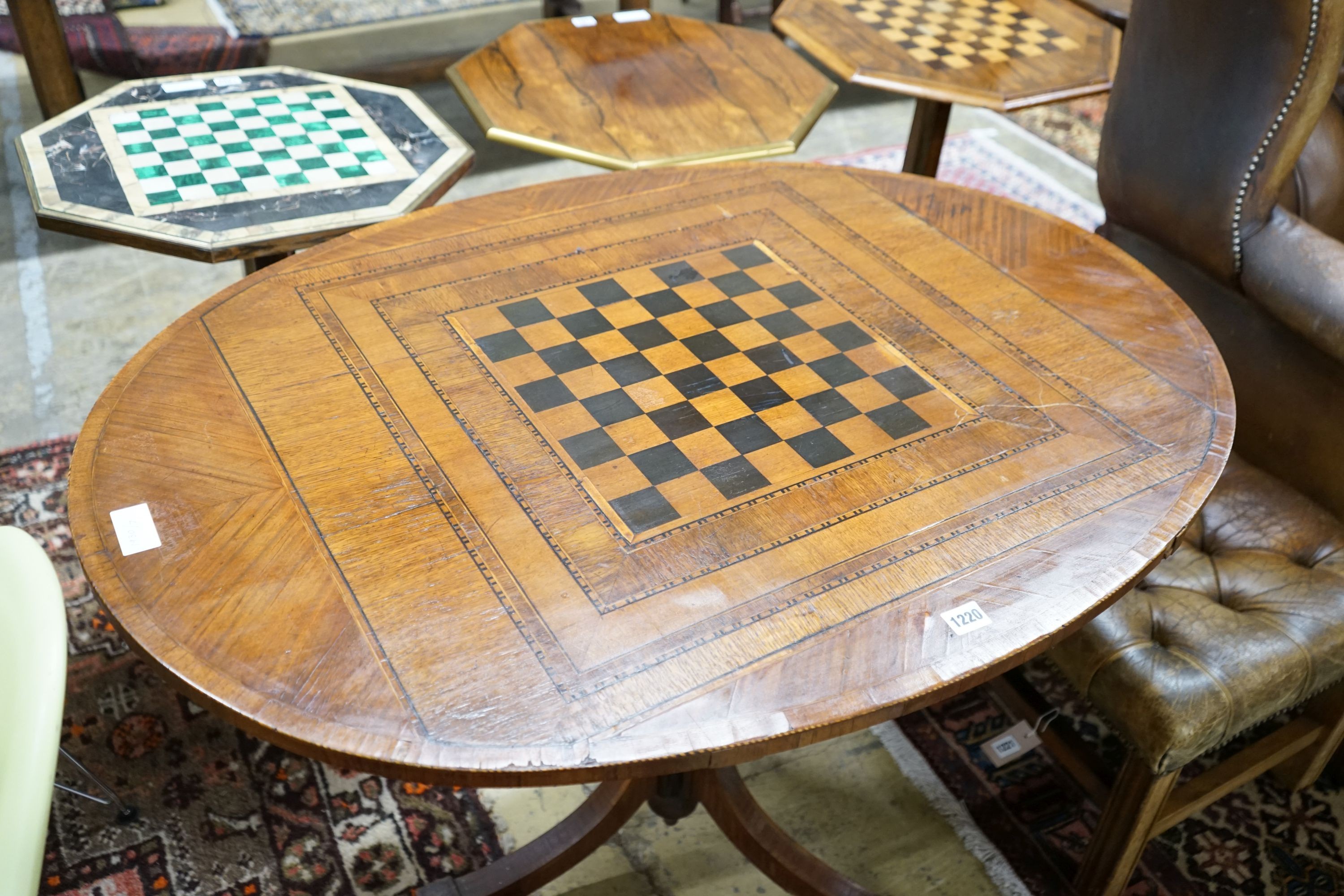 A George III style oval parquetry inlaid games table, width 106cm, depth 79cm, height 73cm